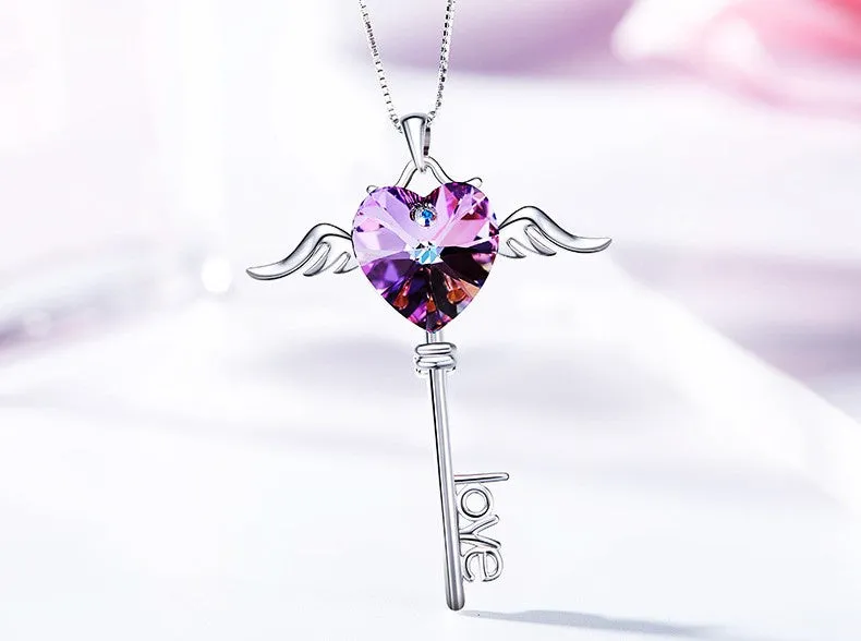 Sterling silver sapphire winged key necklace